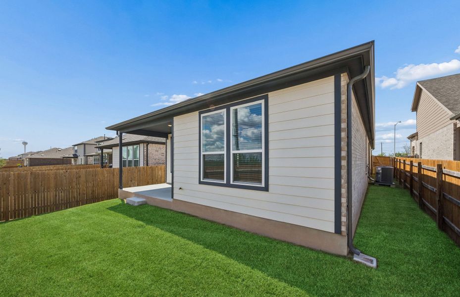 Exterior details and patio area of a home in Crosswinds, Kyle (Image 19).