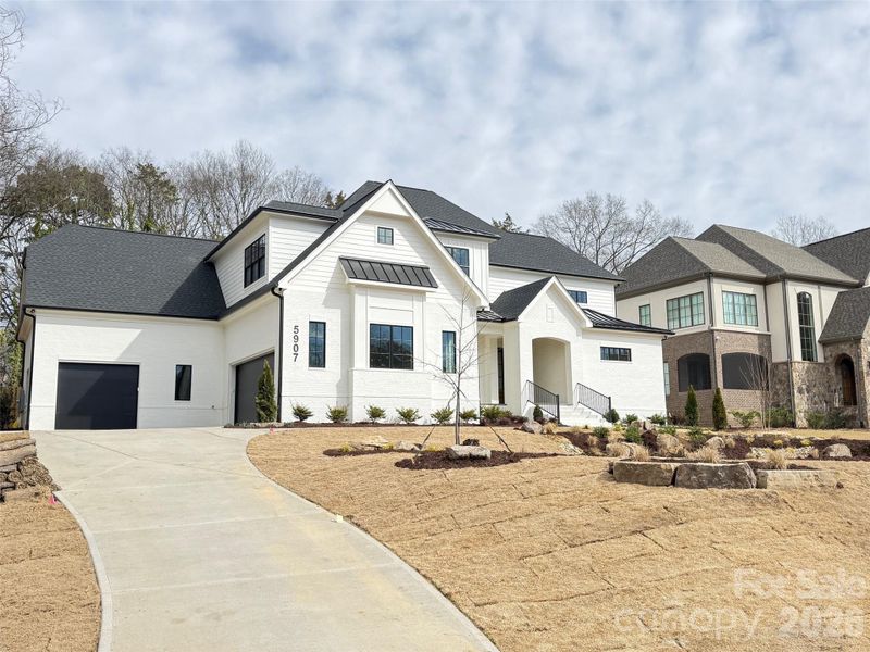 Front exterior of a new home in , Charlotte, NC, highlighting curb appeal (Image 11).