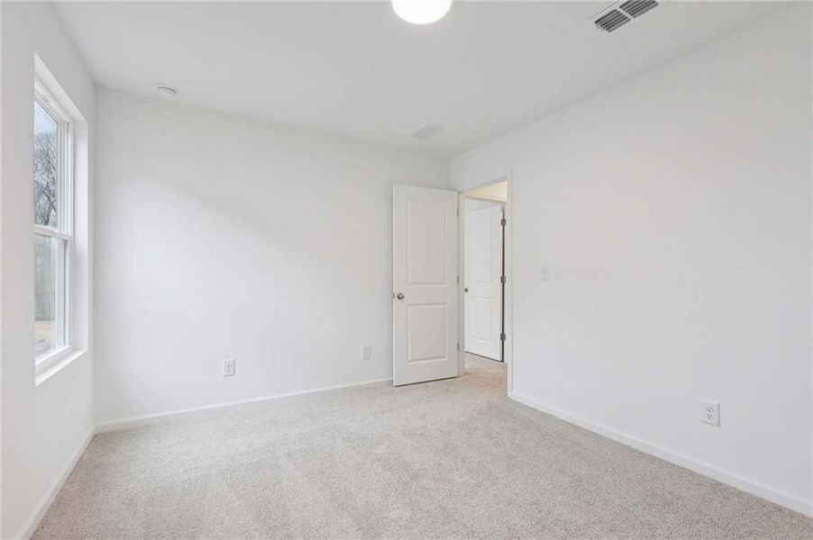 Spacious, unfurnished interior of a new home in The Pointe at Heron Bay, Locust Grove (Image 16).