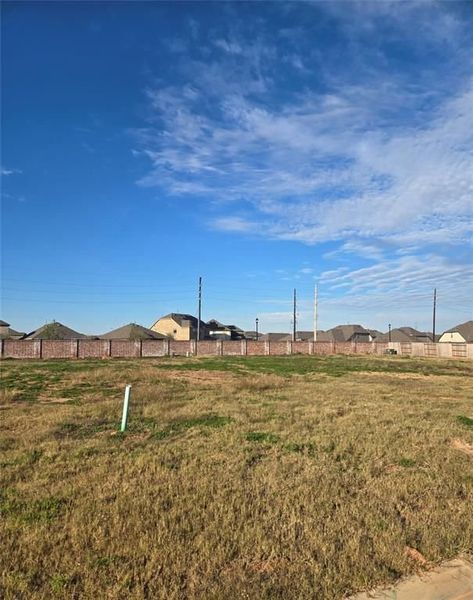 Front exterior of a new home in Sunterra, Katy, TX, highlighting curb appeal (Image 57). Front exterior of a new home in Sunterra, Katy, TX, highlighting curb appeal (Image 57).