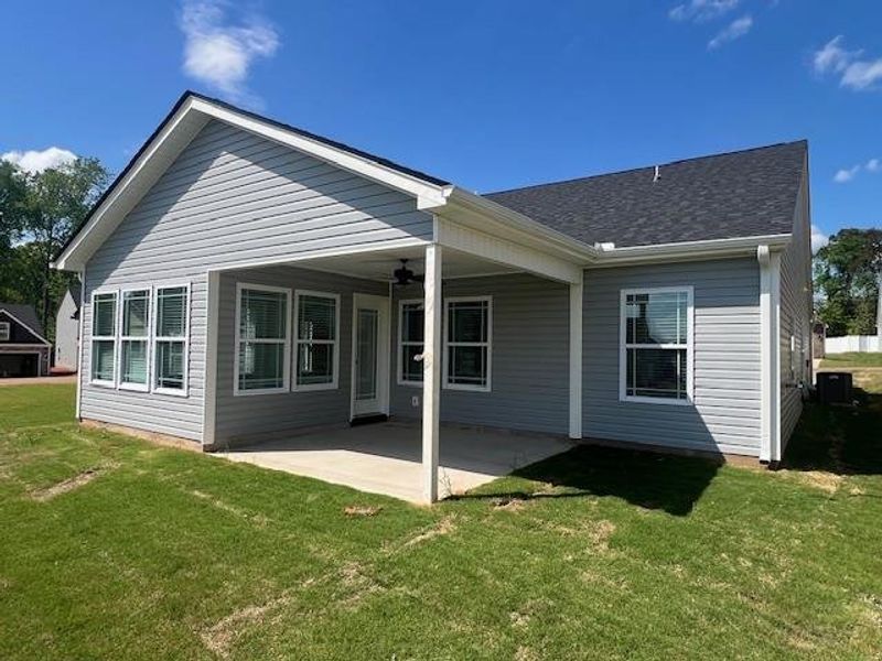 Front exterior of a new home in Cleveland Meadows, Spartanburg, SC, highlighting curb appeal (Image 17).