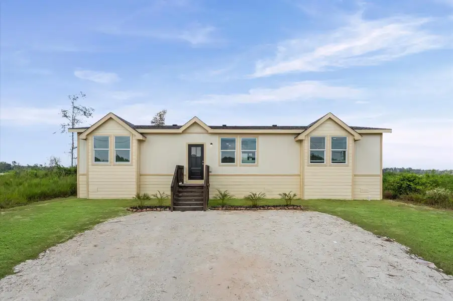 Front exterior of a new home in , Huffman, TX, highlighting curb appeal (Image 2). Front exterior of a new home in , Huffman, TX, highlighting curb appeal (Image 2).