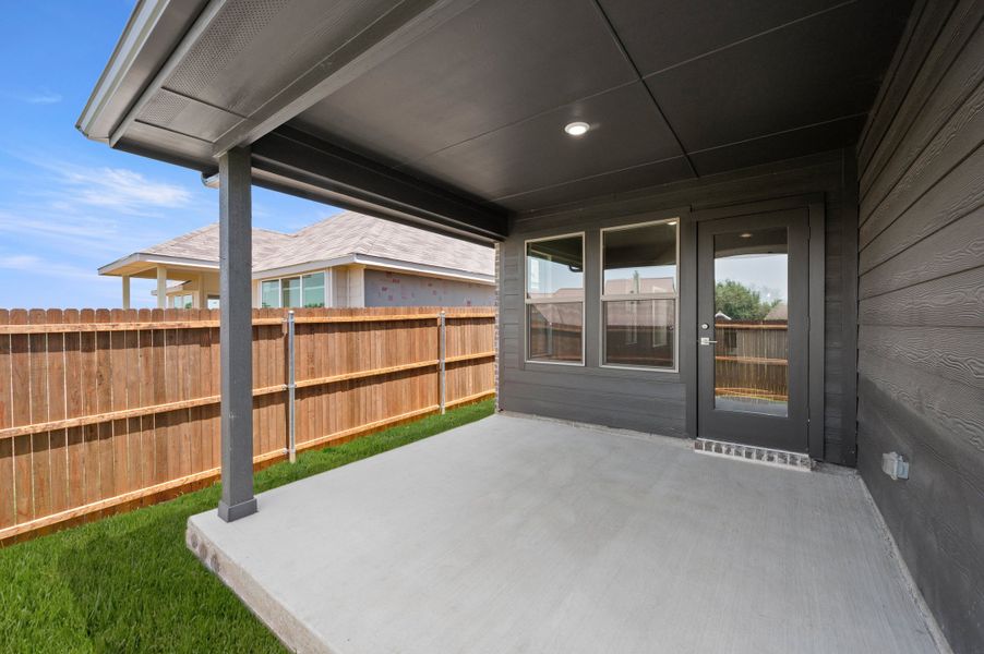 Exterior details and patio area of a home in Pirate Village, Granbury (Image 3).
