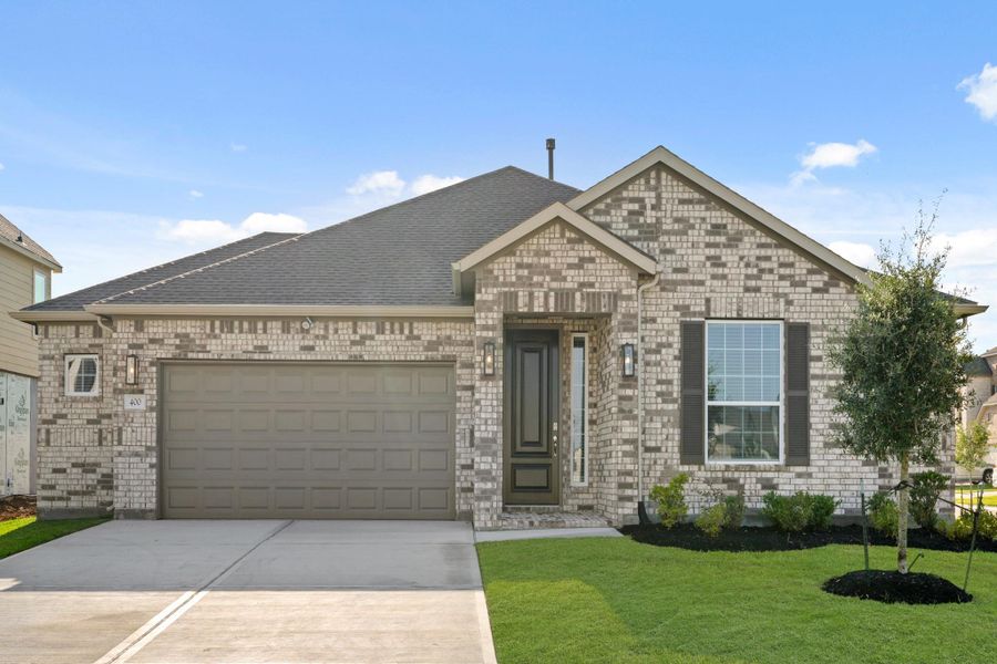 Front exterior of a new home in Beacon Hill, Waller, TX, highlighting curb appeal (Image 1).