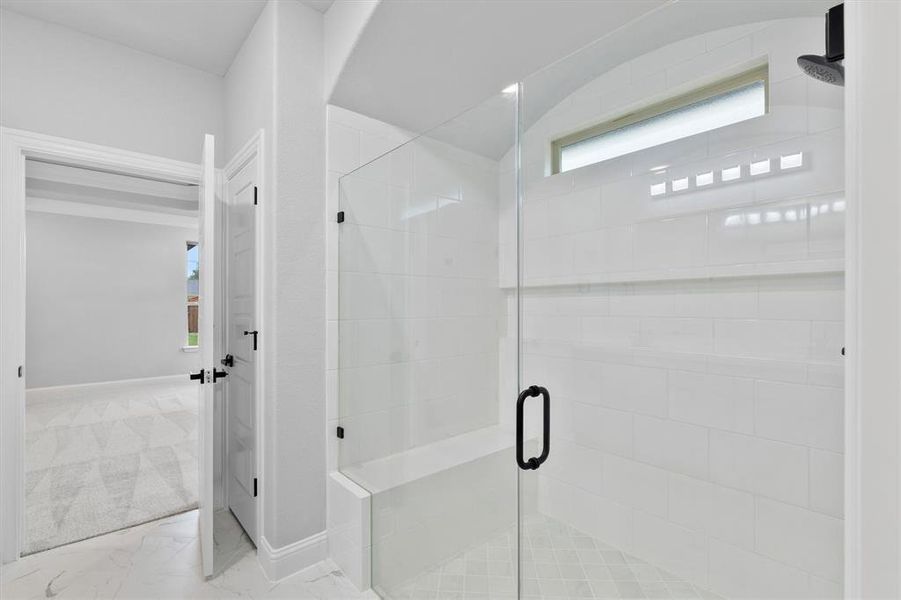 Bathroom featuring an enclosed shower