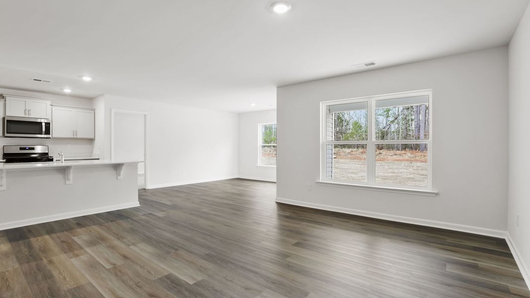 Spacious, unfurnished interior of a new home in Bentley Park, Greenwood (Image 19).