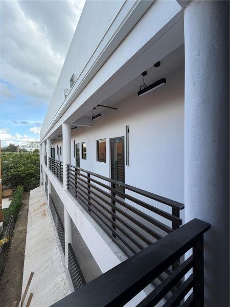 Exterior details and patio area of a home in , Miami (Image 32). Exterior details and patio area of a home in , Miami (Image 32).