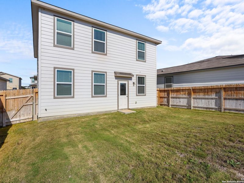 Exterior details and patio area of a home in Applewhite Meadows, San Antonio (Image 3).