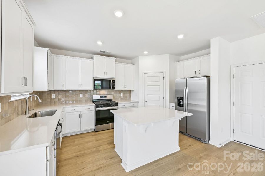 Furnished interior view inside a new home in Bella Vista Heritage, Denver (Image 8).