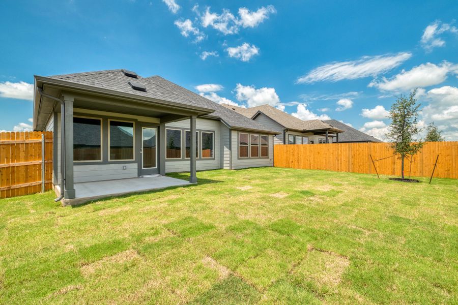 Exterior details and patio area of a home in Prairie Winds, Hutto (Image 4).