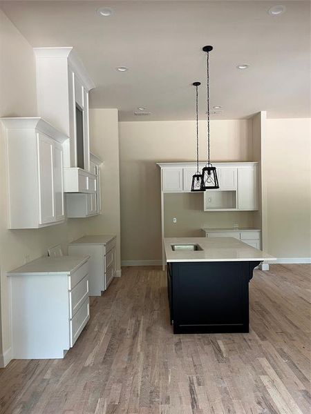 Side view of kitchen. Giant 10x8 walk-in pantry around the corner Side view of kitchen. Giant 10x8 walk-in pantry around the corner