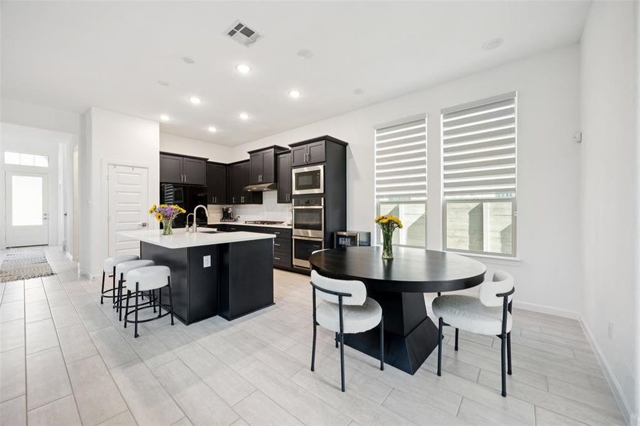 Furnished interior view inside a new home in Villas at the Station, Sachse (Image 21).