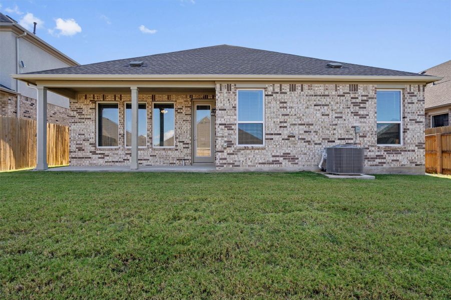 Exterior details and patio area of a home in Rosenbusch Ranch, Leander (Image 2). Exterior details and patio area of a home in Rosenbusch Ranch, Leander (Image 2).