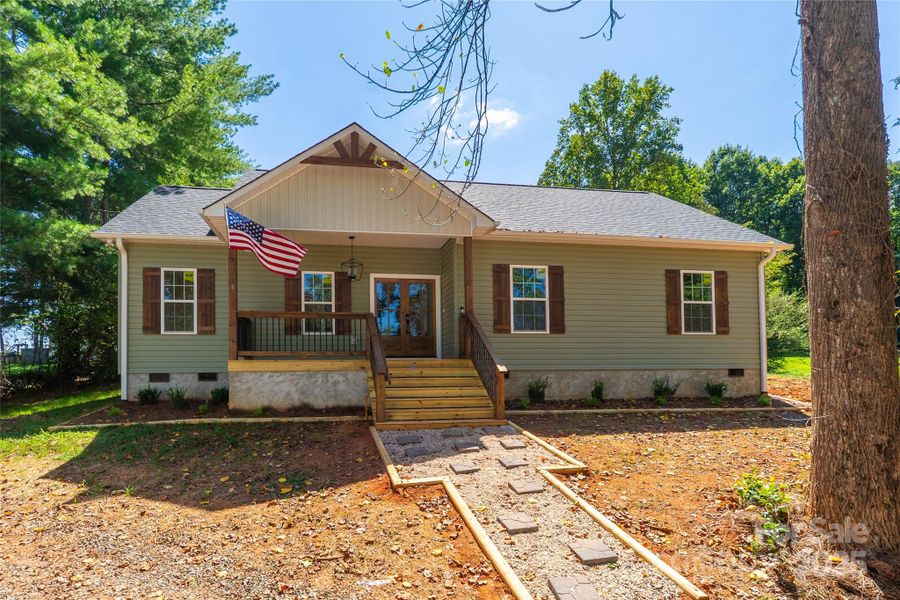 Front exterior of a new home in , Claremont, NC, highlighting curb appeal (Image 17).