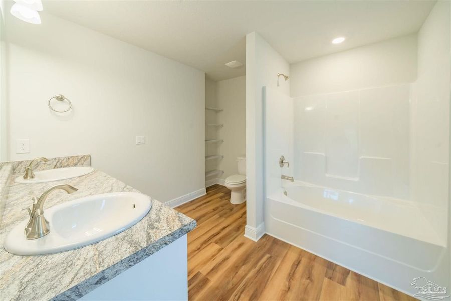 Representative furnished interior of a home built from the Plan 1515 Cottage by Adams Homes in Turtle Creek, Cantonment (Image 6).