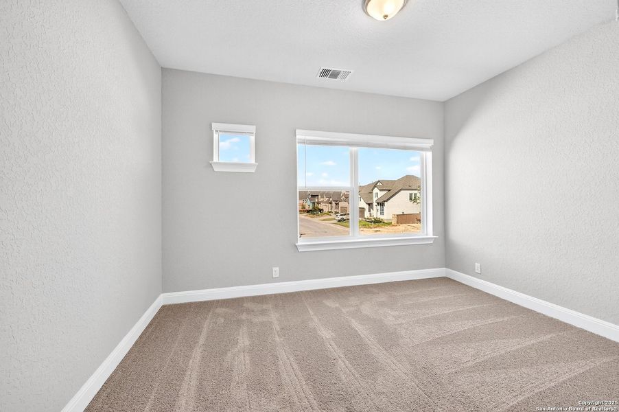 Spacious, unfurnished interior of a new home in Davis Ranch 60', San Antonio (Image 26).