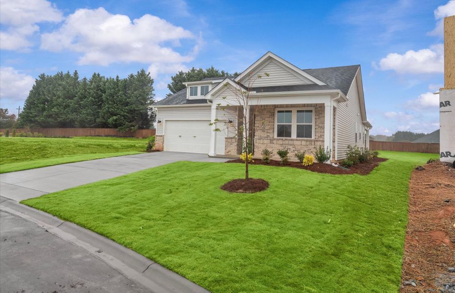 Front exterior of a new home in Fox Hollow, Spartanburg, SC, highlighting curb appeal (Image 23). Front exterior of a new home in Fox Hollow, Spartanburg, SC, highlighting curb appeal (Image 23).