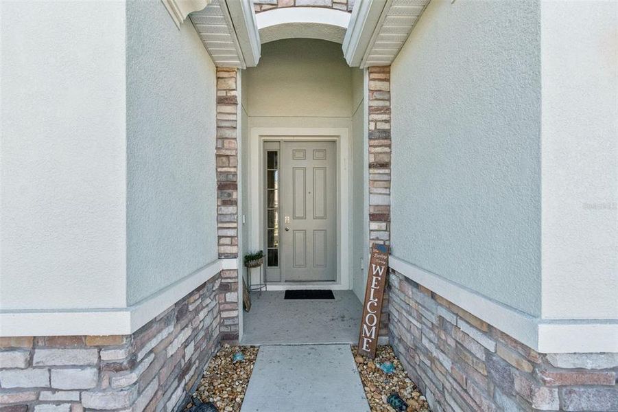Exterior details and patio area of a home in Bella Lago, Parrish (Image 27).