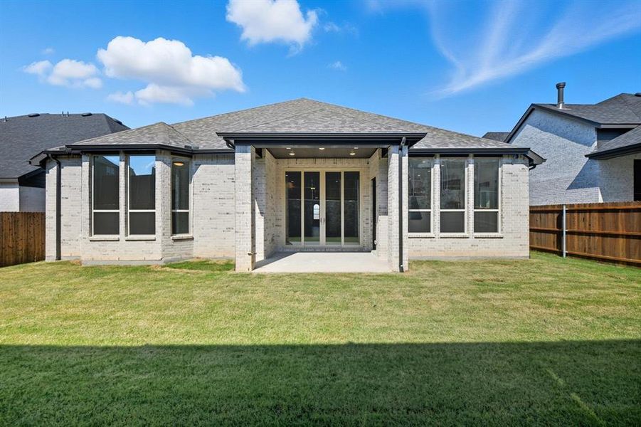 Exterior details and patio area of a home in Wildflower Ranch: Artisan Series - 60ft. lots, Dish (Image 2). Exterior details and patio area of a home in Wildflower Ranch: Artisan Series - 60ft. lots, Dish (Image 2).
