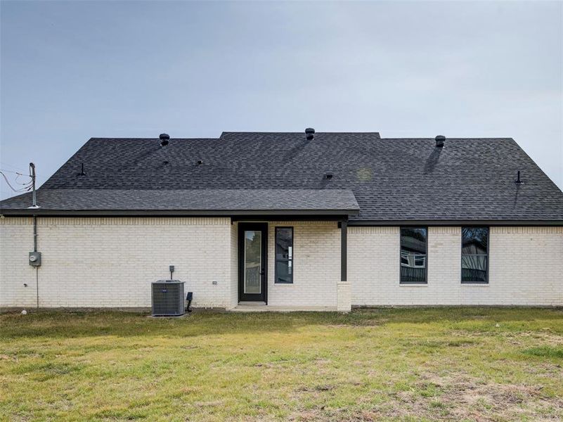 Exterior details and patio area of a home in , Runaway Bay (Image 17).