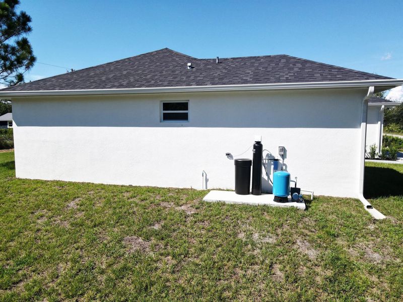 Front exterior of a new home in , Okeechobee, FL, highlighting curb appeal (Image 18).