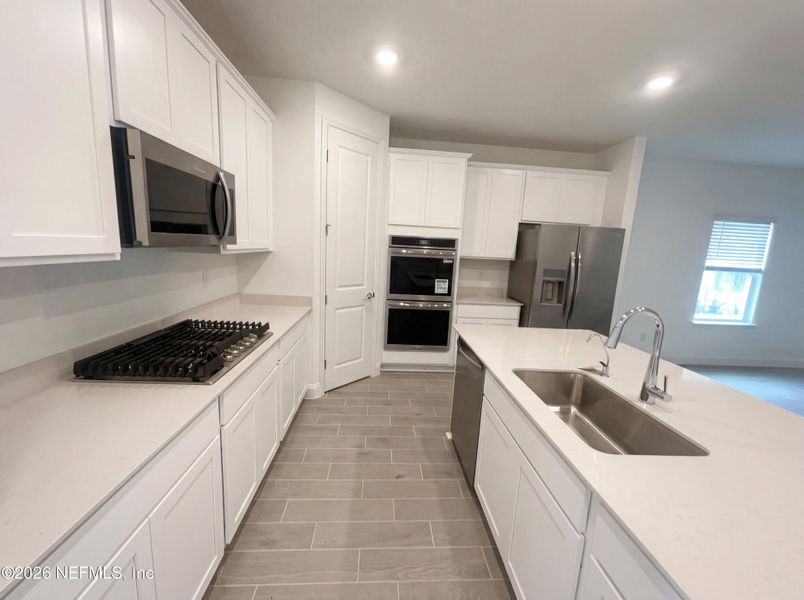 Furnished interior view inside a new home in Tributary, Yulee (Image 5).