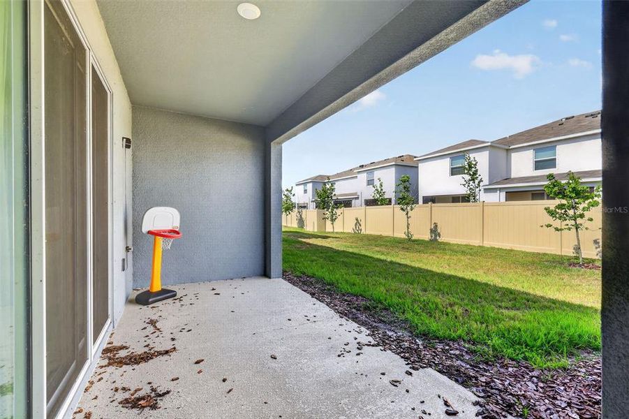 Exterior details and patio area of a home in Mangrove Point, Apollo Beach (Image 28).