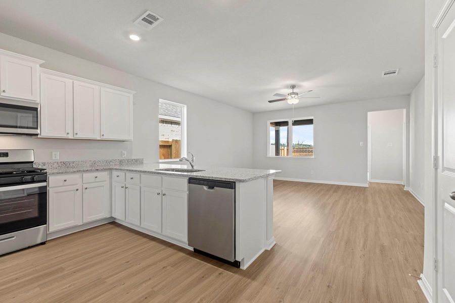 Furnished interior view inside a new home in Emberly, Beasley (Image 5).