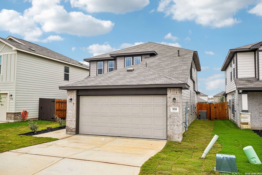 Front exterior of a new home in Willow Point, San Antonio, TX, highlighting curb appeal (Image 2). Front exterior of a new home in Willow Point, San Antonio, TX, highlighting curb appeal (Image 2).