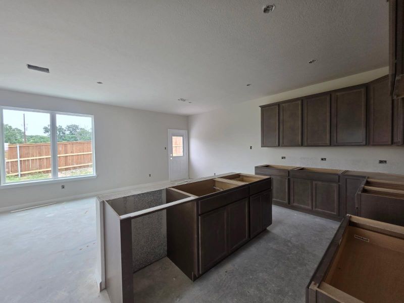 In-progress construction of a new home in Heartland at Vintage Farms, Brenham, TX (Image 9).