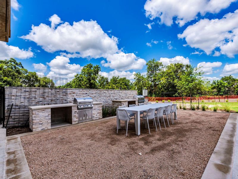 View of patio / terrace with an outdoor kitchen / dining area View of patio / terrace with an outdoor kitchen / dining area