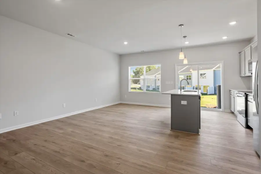 Spacious, unfurnished interior of a new home in West Main Townhomes, Sanford (Image 18).