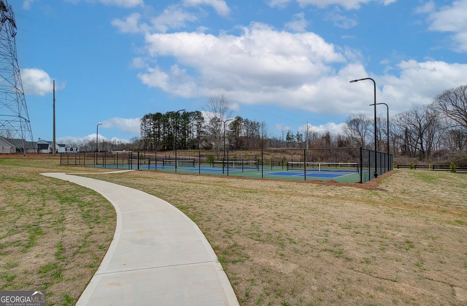 Front exterior of a new home in Ponderosa Farms Manor, Gainesville, GA, highlighting curb appeal (Image 28).