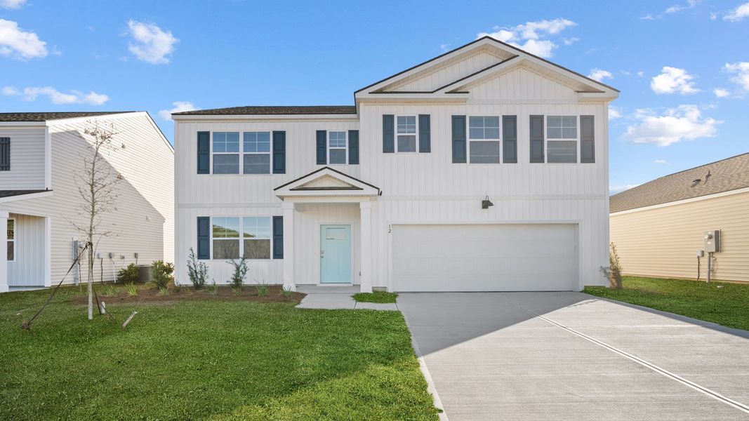 Front exterior of a new home in Rice Hope, Port Wentworth, GA, highlighting curb appeal (Image 1). Front exterior of a new home in Rice Hope, Port Wentworth, GA, highlighting curb appeal (Image 1).