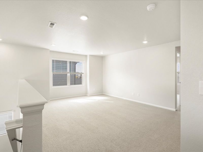 Spacious, unfurnished interior of a new home in Buffalo Highlands: The Flora Collection, Commerce City (Image 11).