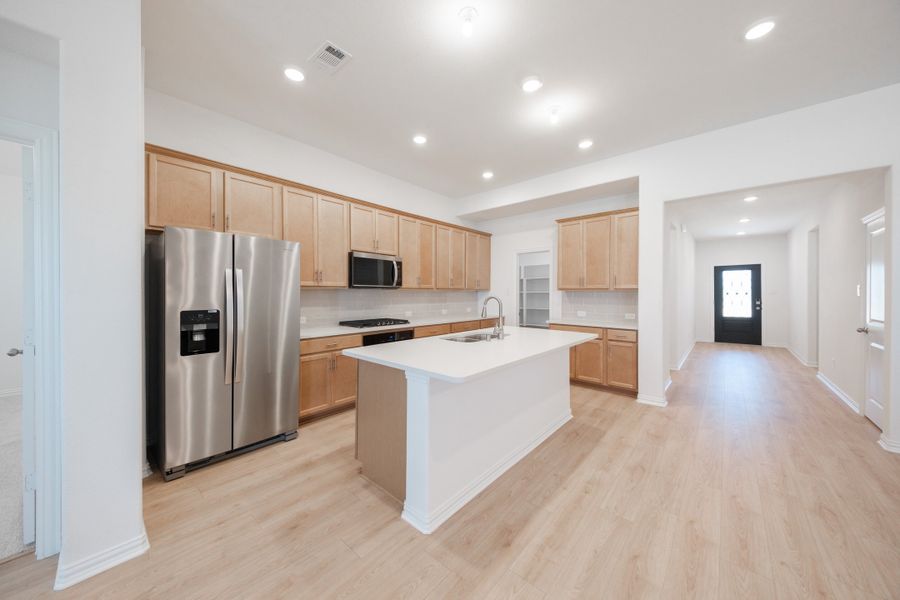 Furnished interior view inside a new home in The Villages of Hurricane Creek, Anna (Image 7).