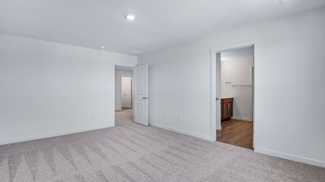 Spacious, unfurnished interior of a new home in Trails at Crowfoot, Parker (Image 37).
