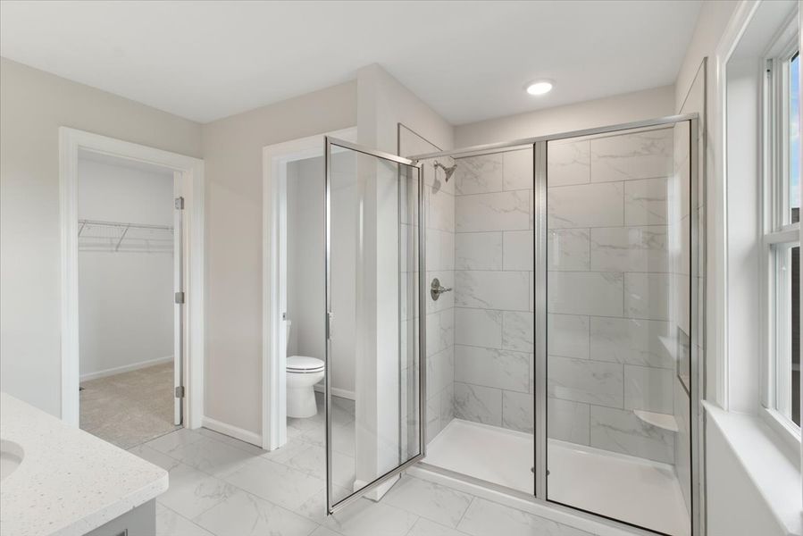 Primary Bathroom | 6244 Canterbury Farms Pkwy by Ivey Homes