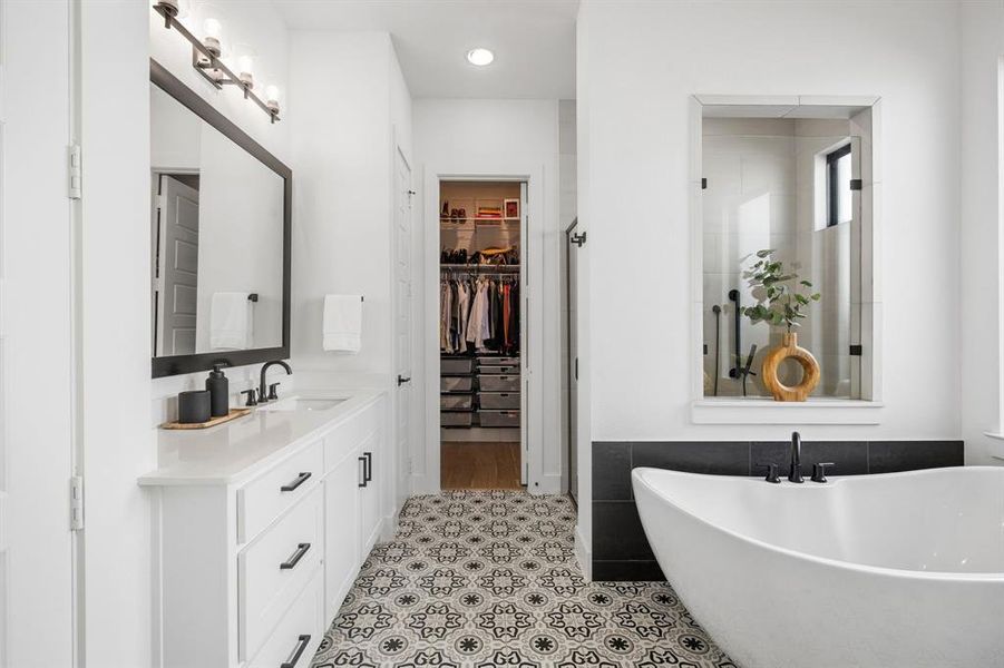 Primary bedroom has two walk-in closets, one of them comes equipped with an Elfa shelf system. Primary bedroom has two walk-in closets, one of them comes equipped with an Elfa shelf system.