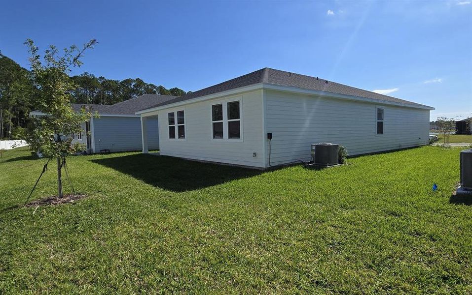 Exterior details and patio area of a home in , Palm Coast (Image 4). Exterior details and patio area of a home in , Palm Coast (Image 4).