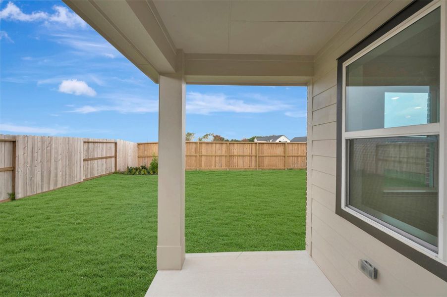 Relax outdoors on the covered patio Relax outdoors on the covered patio
