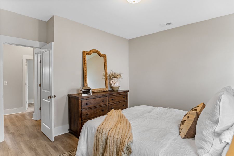 Representative furnished interior of a home built from the Hanover by Bill Clark Homes in Osprey Landing, Southport (Image 16).