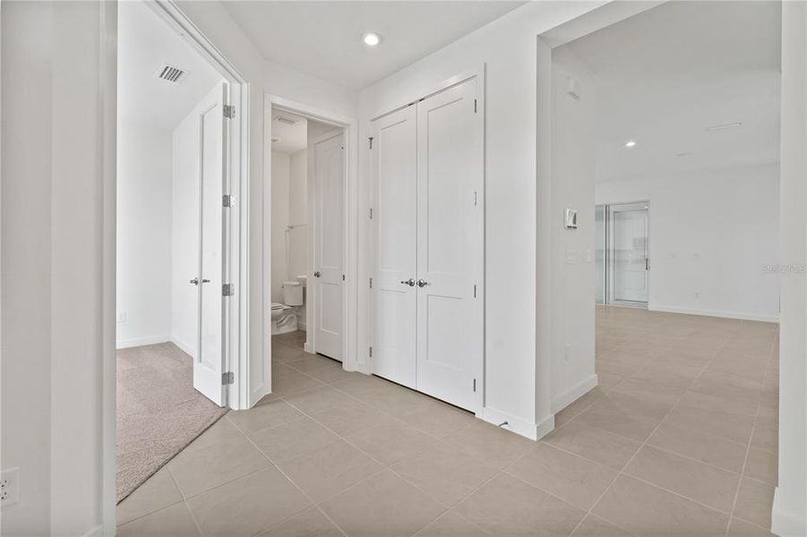 Entryway with private study and powder bath.