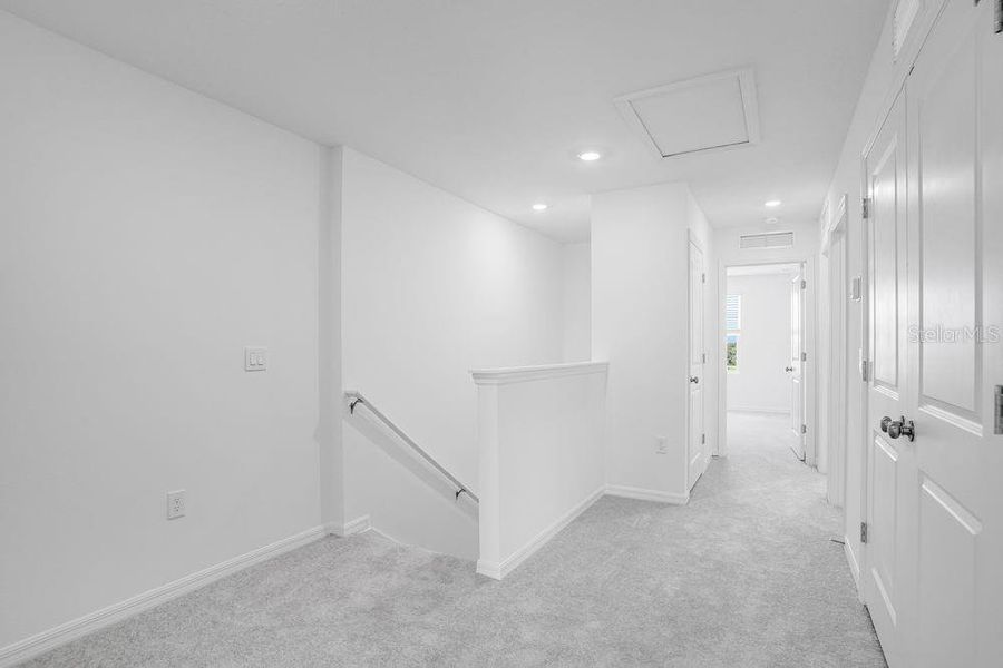 Spacious, unfurnished interior of a new home in Waterstone Townhomes, Groveland (Image 23).