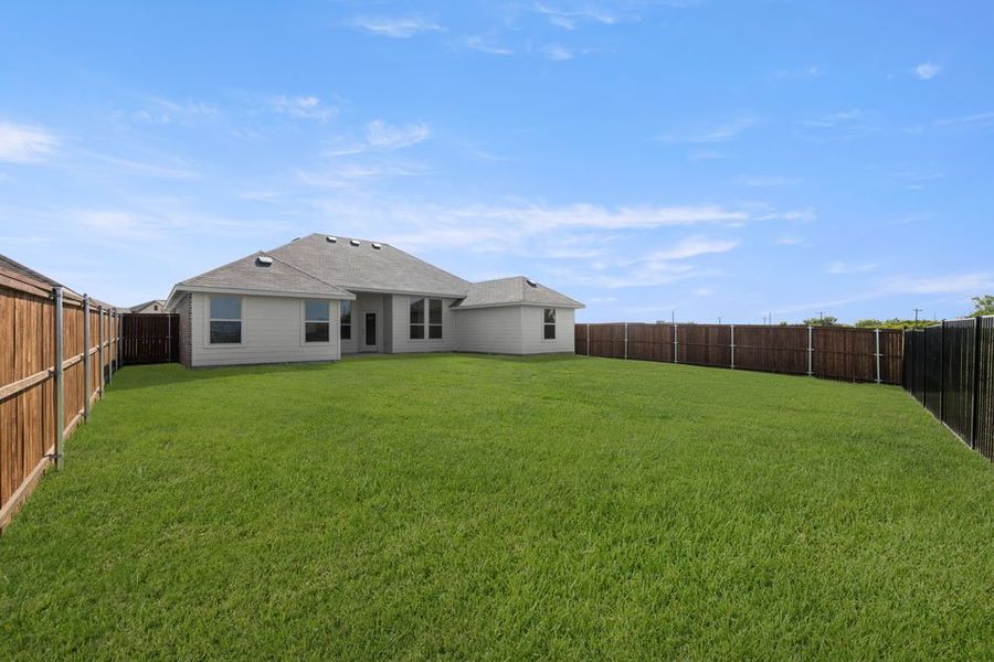 Front exterior of a new home in Still Water Lake, Godley, TX, highlighting curb appeal (Image 8). Front exterior of a new home in Still Water Lake, Godley, TX, highlighting curb appeal (Image 8).