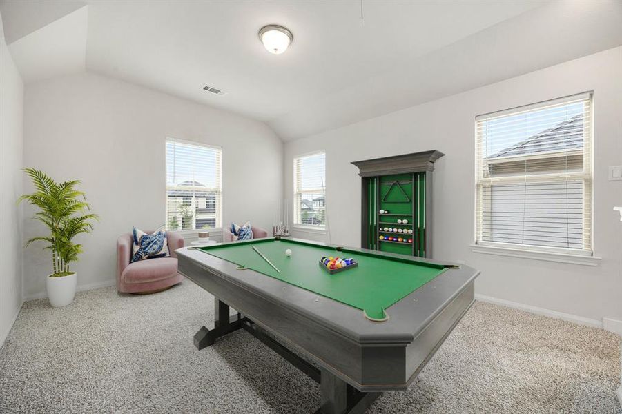 Perfect for entertaining is this amazing game room!  Right upstairs this space would be a fabulous teen hangout, or adult game room complete with pool table and big screen TVs. Featuring plush carpet, high ceilings, neutral paint and large windows with privacy blinds.