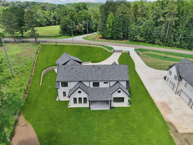 Front exterior of a new home in , Braselton, GA, highlighting curb appeal (Image 40). Front exterior of a new home in , Braselton, GA, highlighting curb appeal (Image 40).
