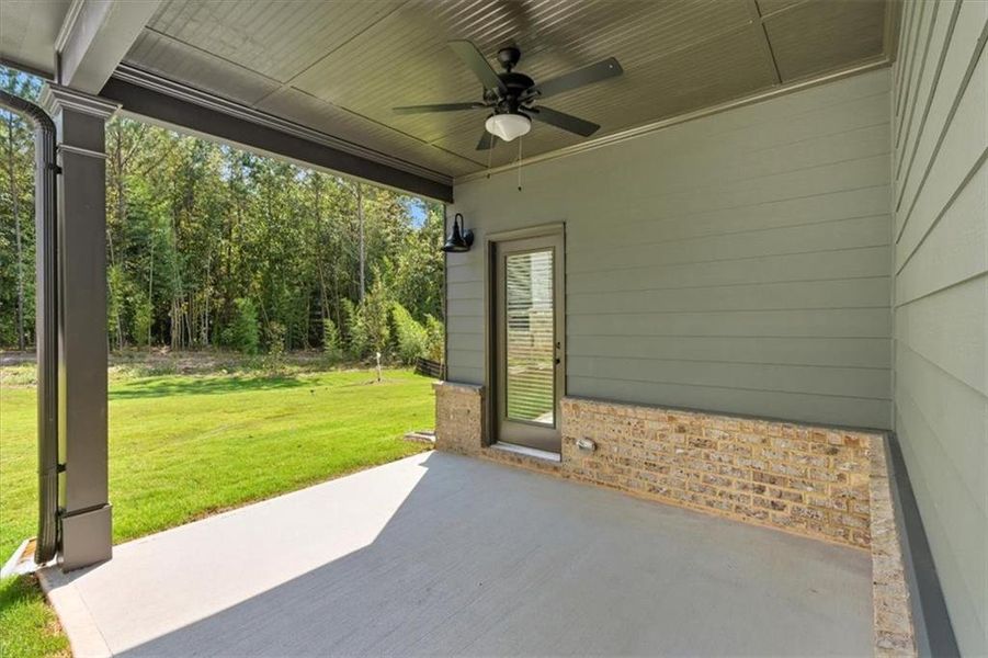 Exterior details and patio area of a home in Meadow Pines, Dallas (Image 14).