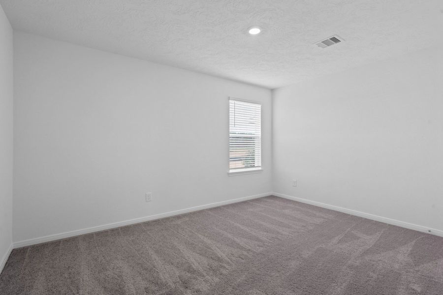 Spacious, unfurnished interior of a new home in Grace Landing, Willis (Image 21).