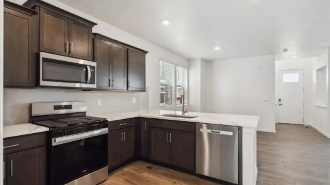 Furnished interior view inside a new home in Horizon Uptown, Aurora (Image 6).